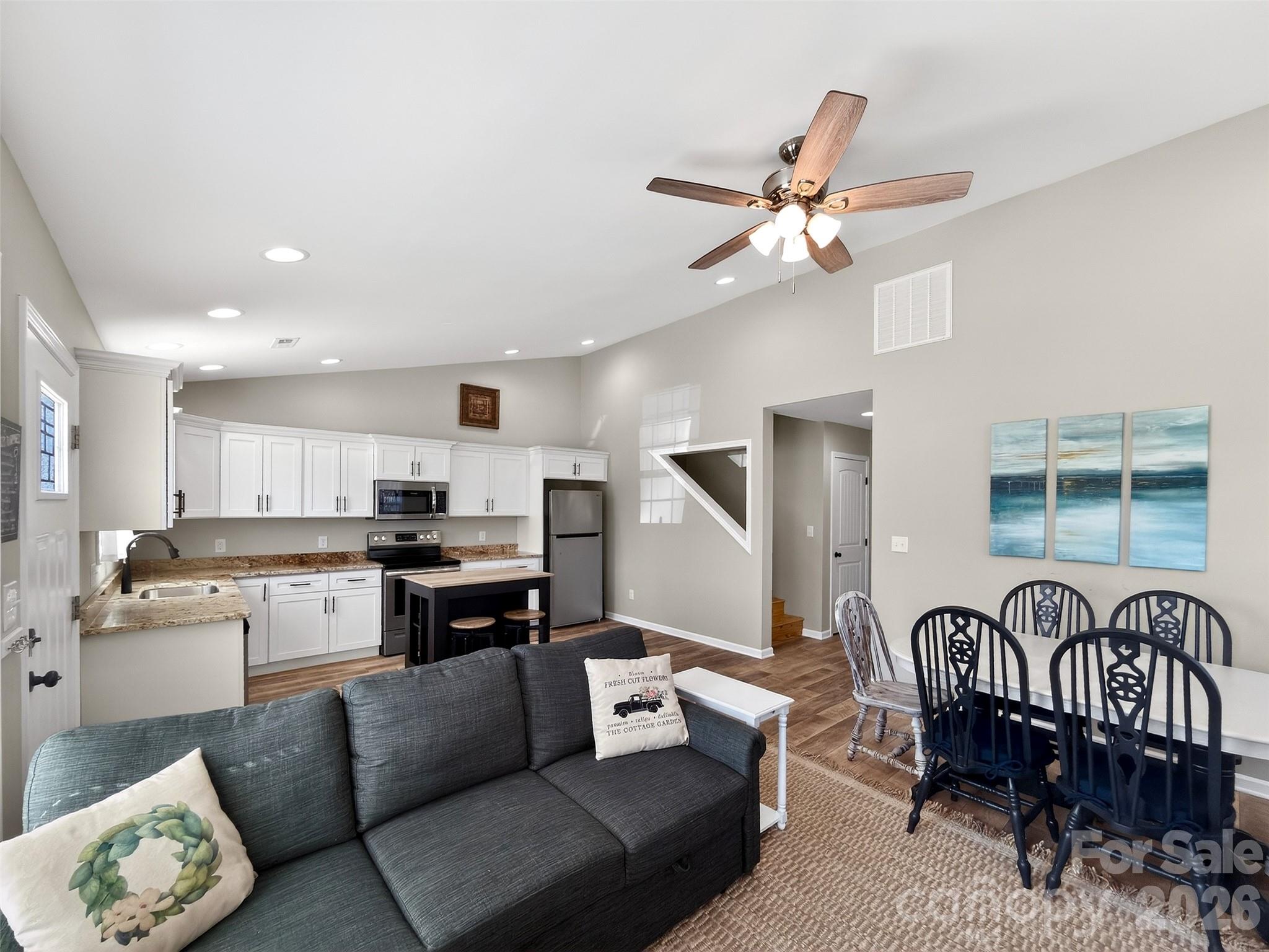 116 Bostic Street Marion, NC 28752 - Photo 13 of 28 a living room with furniture and kitchen view