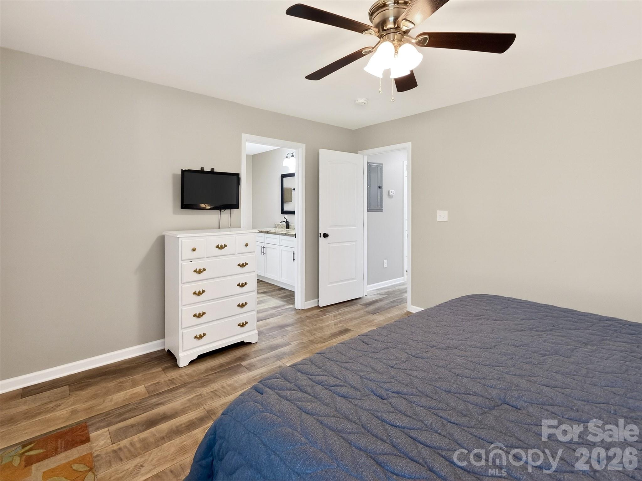 116 Bostic Street Marion, NC 28752 - Photo 15 of 28 an empty room with cabinet and flat screen tv