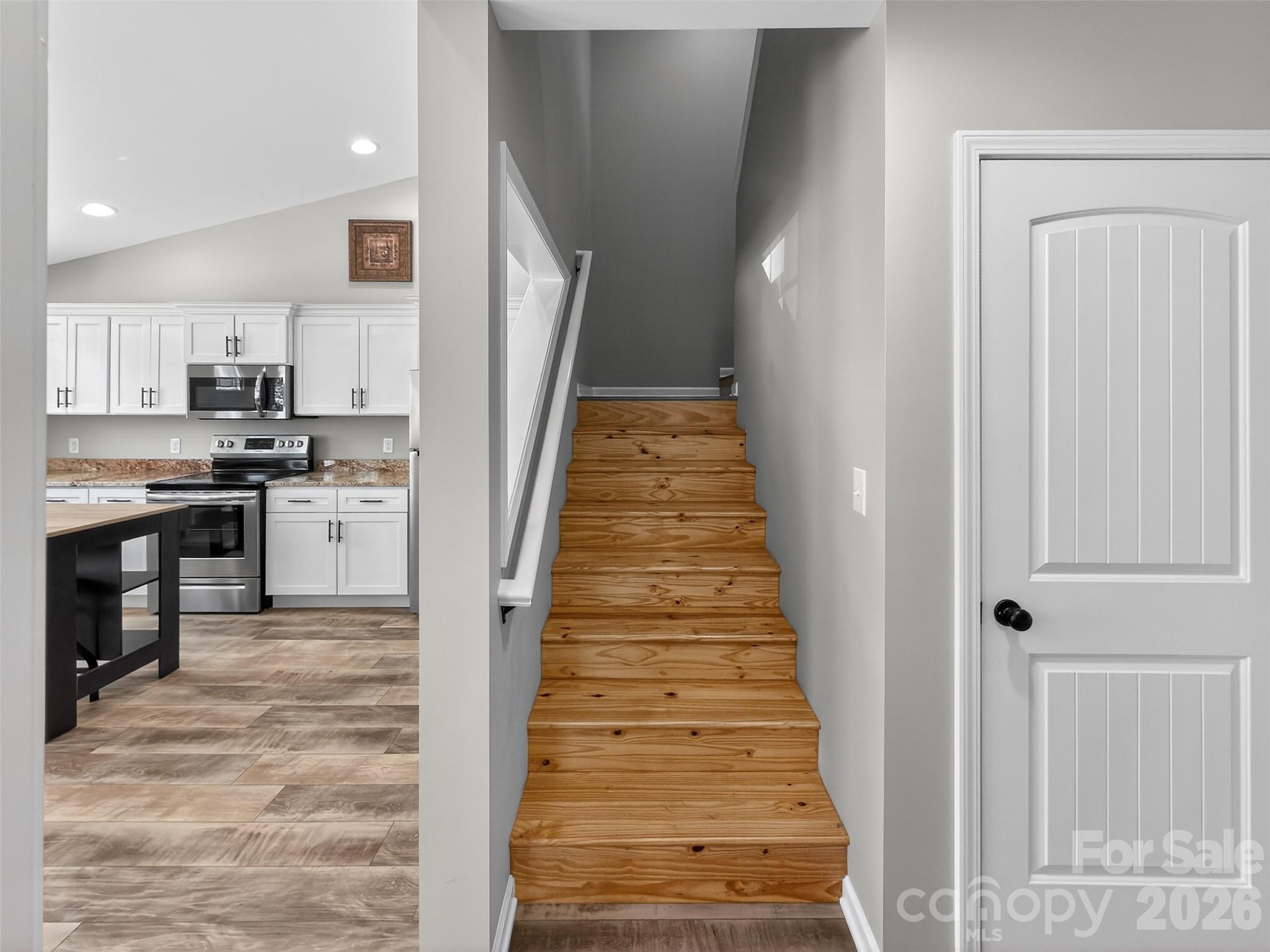 116 Bostic Street Marion, NC 28752 - Photo 19 of 28 a view of a kitchen with cabinets and stainless steel appliances