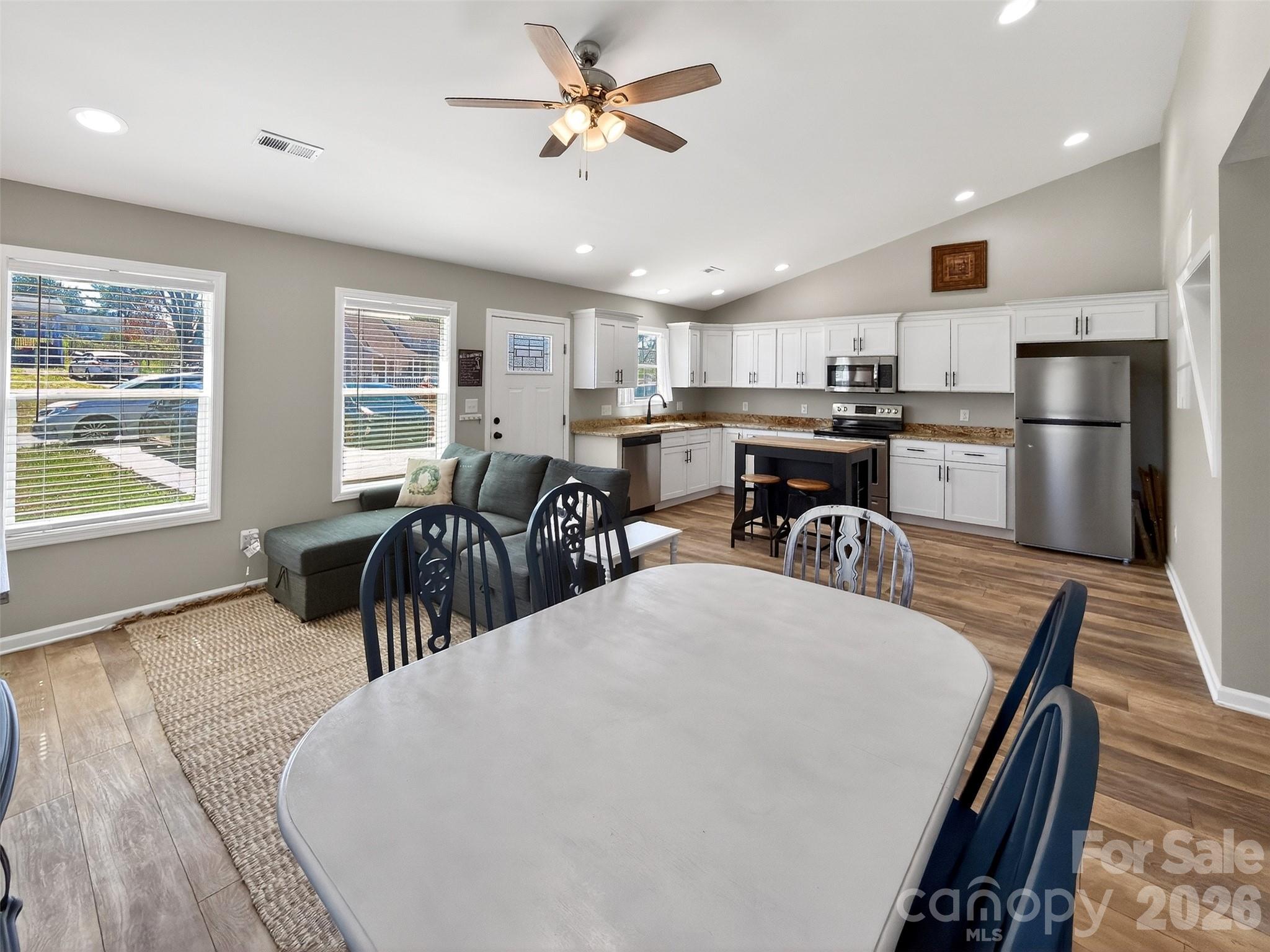 116 Bostic Street Marion, NC 28752 - Photo 8 of 28 a view of a dining room with furniture window and wooden floor
