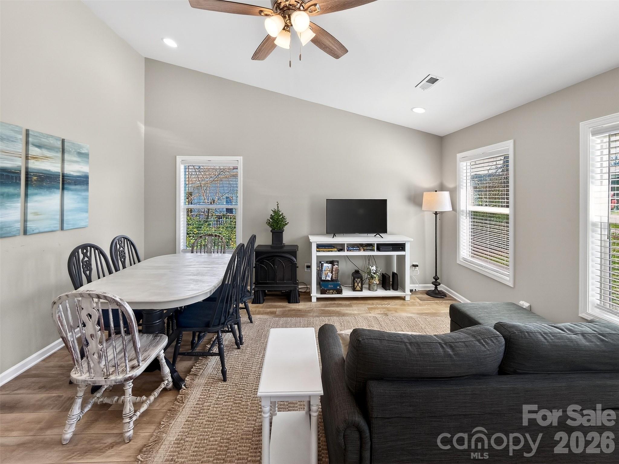 116 Bostic Street Marion, NC 28752 - Photo 10 of 28 a living room with furniture a flat screen tv and a large window
