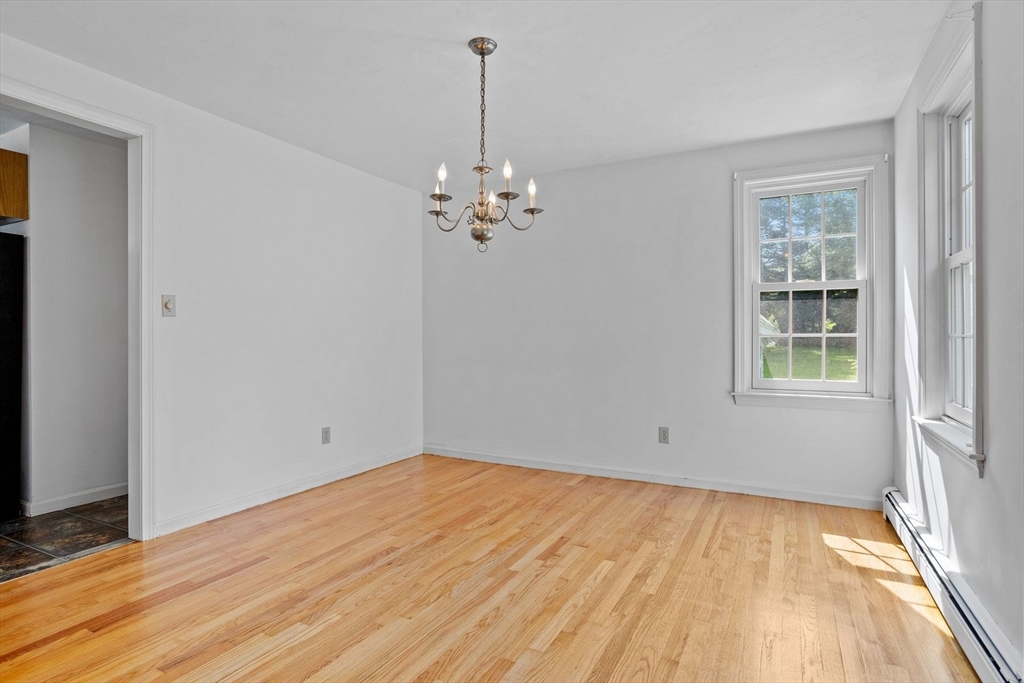 10 Farm Road Stow, MA 01775 - Photo 15 of 37 a view of empty room with wooden floor and fan