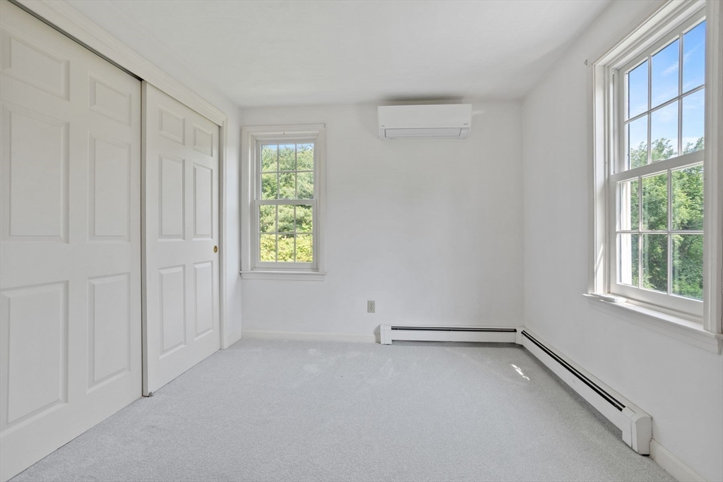 10 Farm Road Stow, MA 01775 - Photo 23 of 37 an empty room with windows