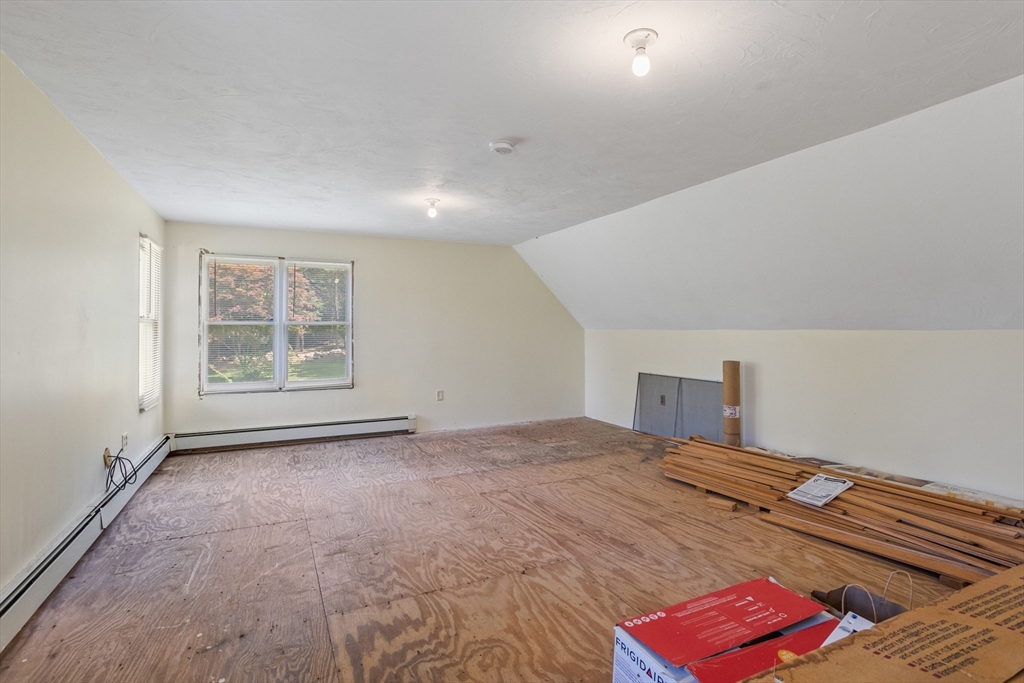 10 Farm Road Stow, MA 01775 - Photo 27 of 37 a view of an empty room with a window