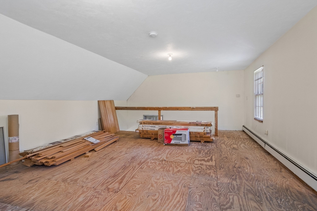 10 Farm Road Stow, MA 01775 - Photo 28 of 37 a car is parked in a room