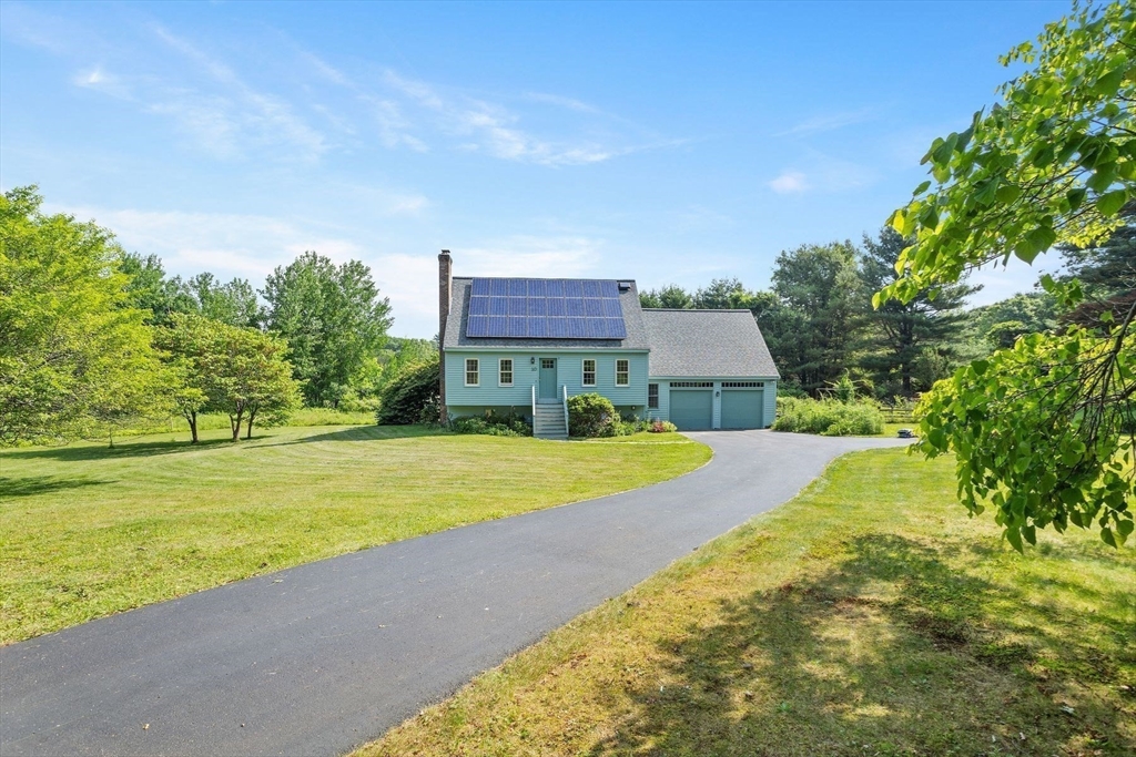 10 Farm Road Stow, MA 01775 - Photo 29 of 37 a view of a house with pool and a yard