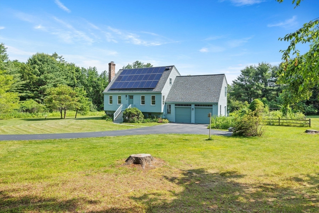 10 Farm Road Stow, MA 01775 - Photo 30 of 37 a view of a house with a big yard