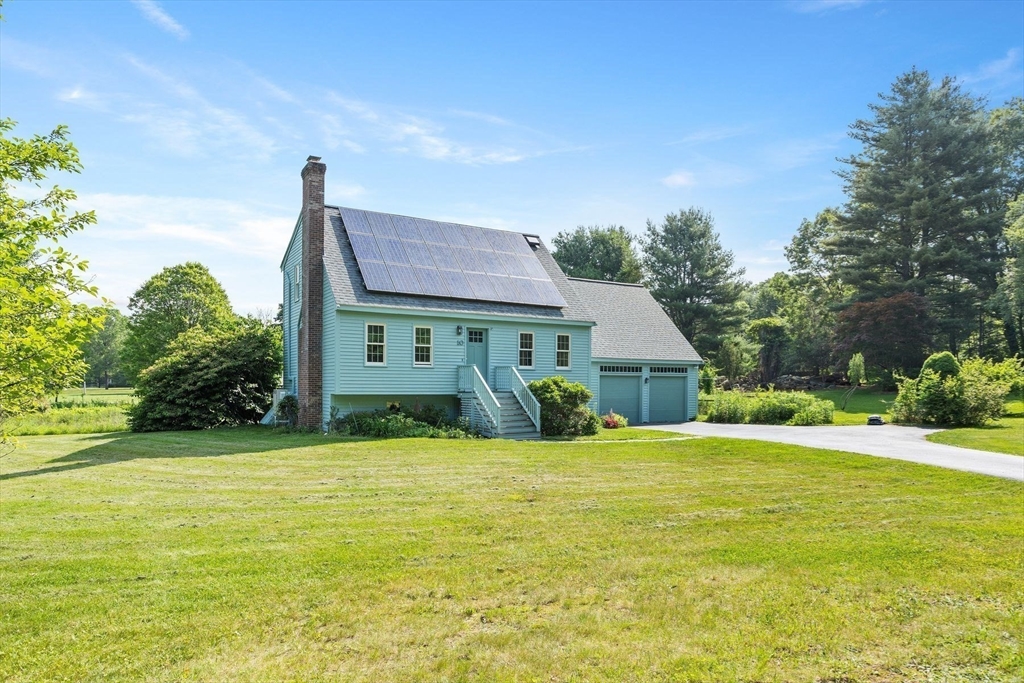 10 Farm Road Stow, MA 01775 - Photo 31 of 37 a view of a house with a yard
