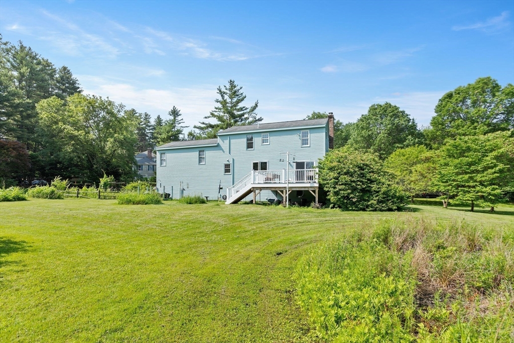 10 Farm Road Stow, MA 01775 - Photo 33 of 37 a view of a house with a yard