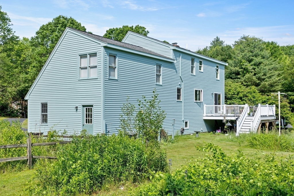 10 Farm Road Stow, MA 01775 - Photo 34 of 37 a house view with a garden space