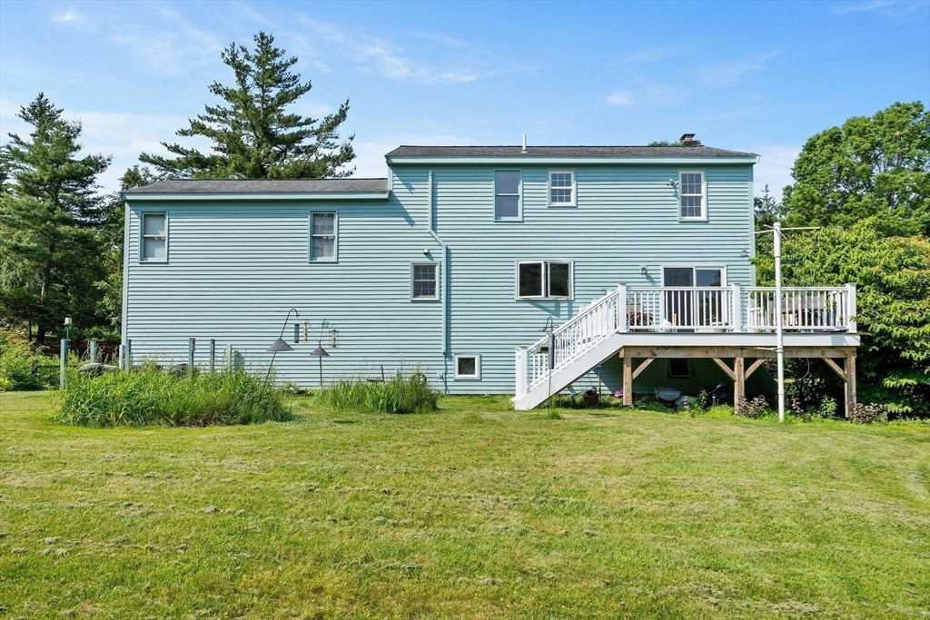 10 Farm Road Stow, MA 01775 - Photo 35 of 37 a view of a house with a yard