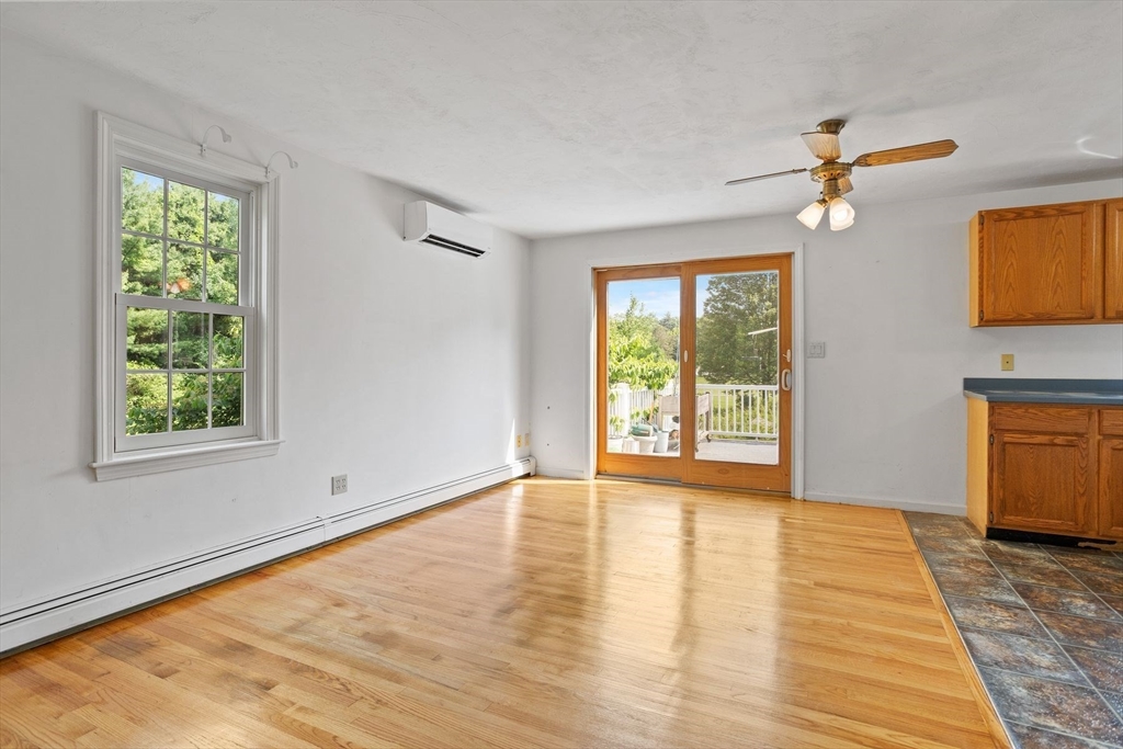 10 Farm Road Stow, MA 01775 - Photo 4 of 37 a view of empty room with wooden floor and fan