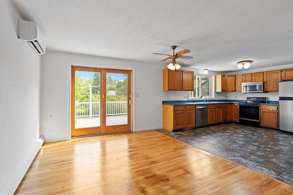 10 Farm Road Stow, MA 01775 - Photo 5 of 37 a view of kitchen with granite countertop stainless steel appliances and cabinets