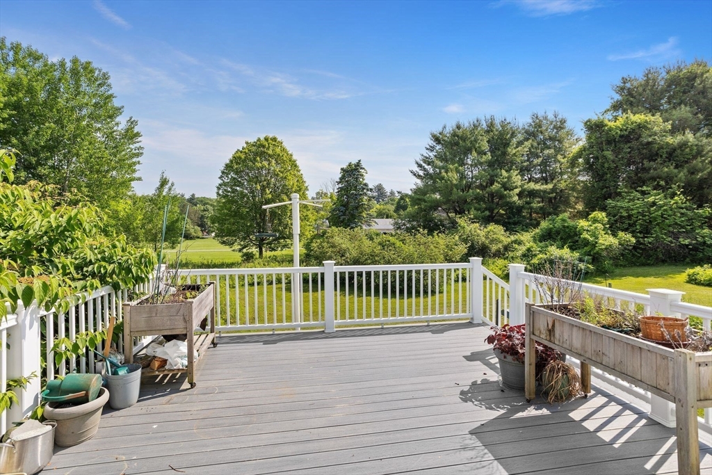 10 Farm Road Stow, MA 01775 - Photo 9 of 37 a view of a chair and table on the wooden floor