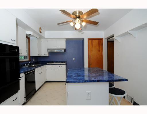 1145 Pentland Avenue Rochester, PA 15074 - Photo 6 of 18 Kitchen. Beside the oven is a split door that leads to the covered back deck