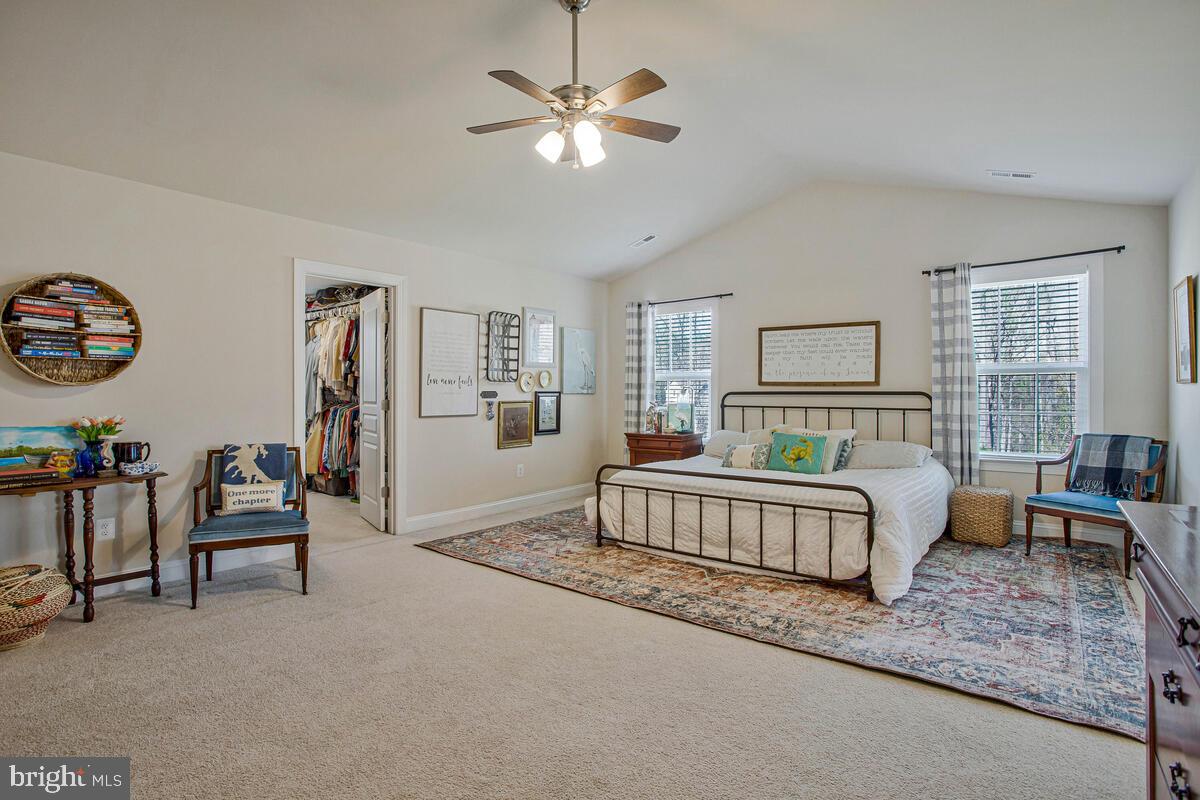 54 Simmons Ridge Road Prince Frederick, MD 20678 - Photo 31 of 55 a bed room with furniture and a chandelier