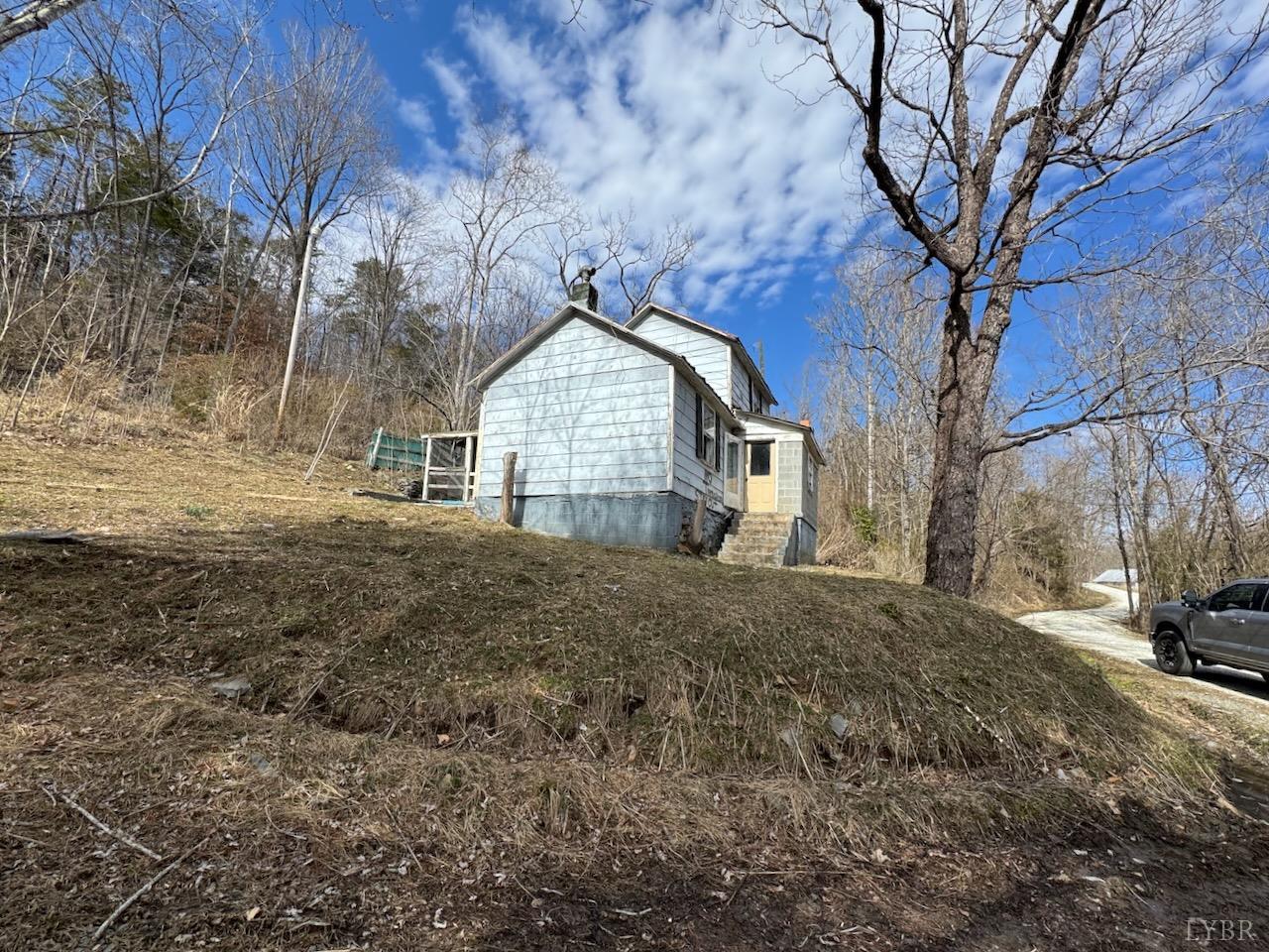5698 Rockfish River Road Schuyler, VA 22969 - Photo 3 of 6 a view of large house with a yard