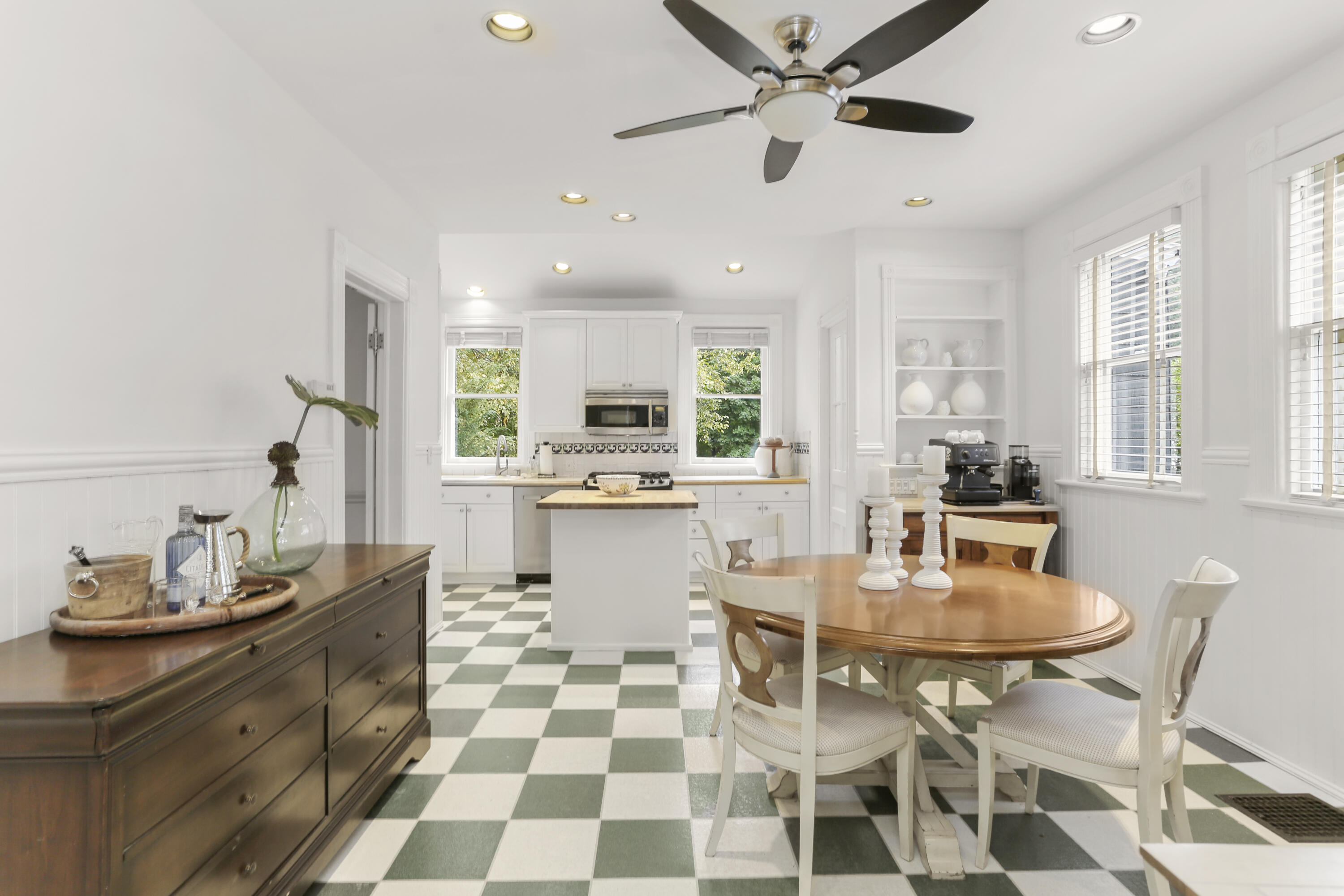 6 Park Lane Darien, CT 06820 - Photo 11 of 34 a kitchen with a dining table cabinets stainless steel appliances and a window