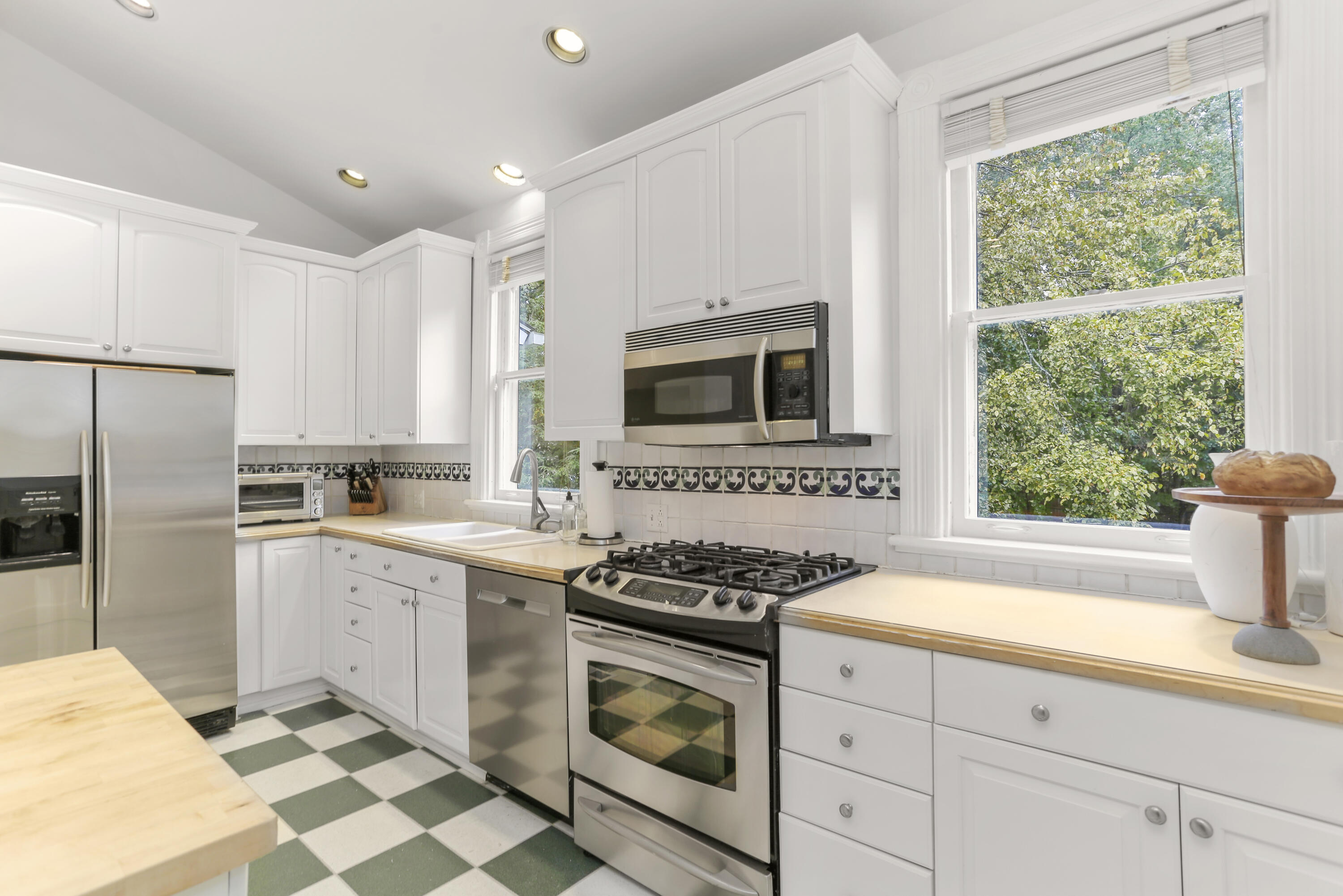 6 Park Lane Darien, CT 06820 - Photo 13 of 34 a kitchen with a sink stove and microwave