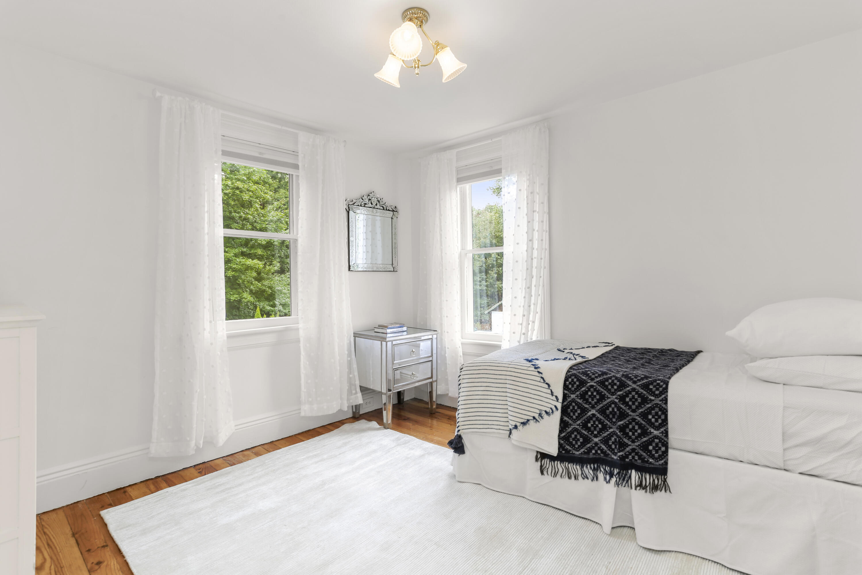 6 Park Lane Darien, CT 06820 - Photo 20 of 34 a living room with furniture and a window