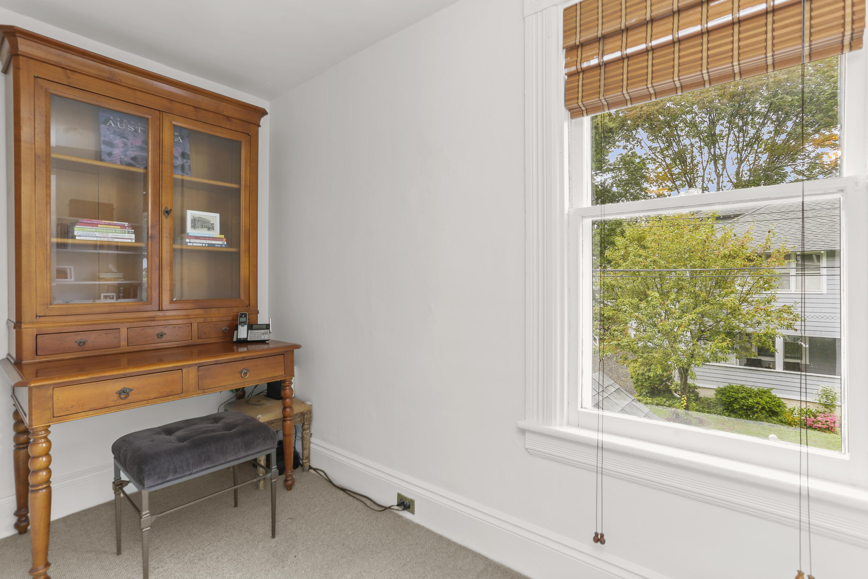 6 Park Lane Darien, CT 06820 - Photo 22 of 34 a room that has a bed and a window