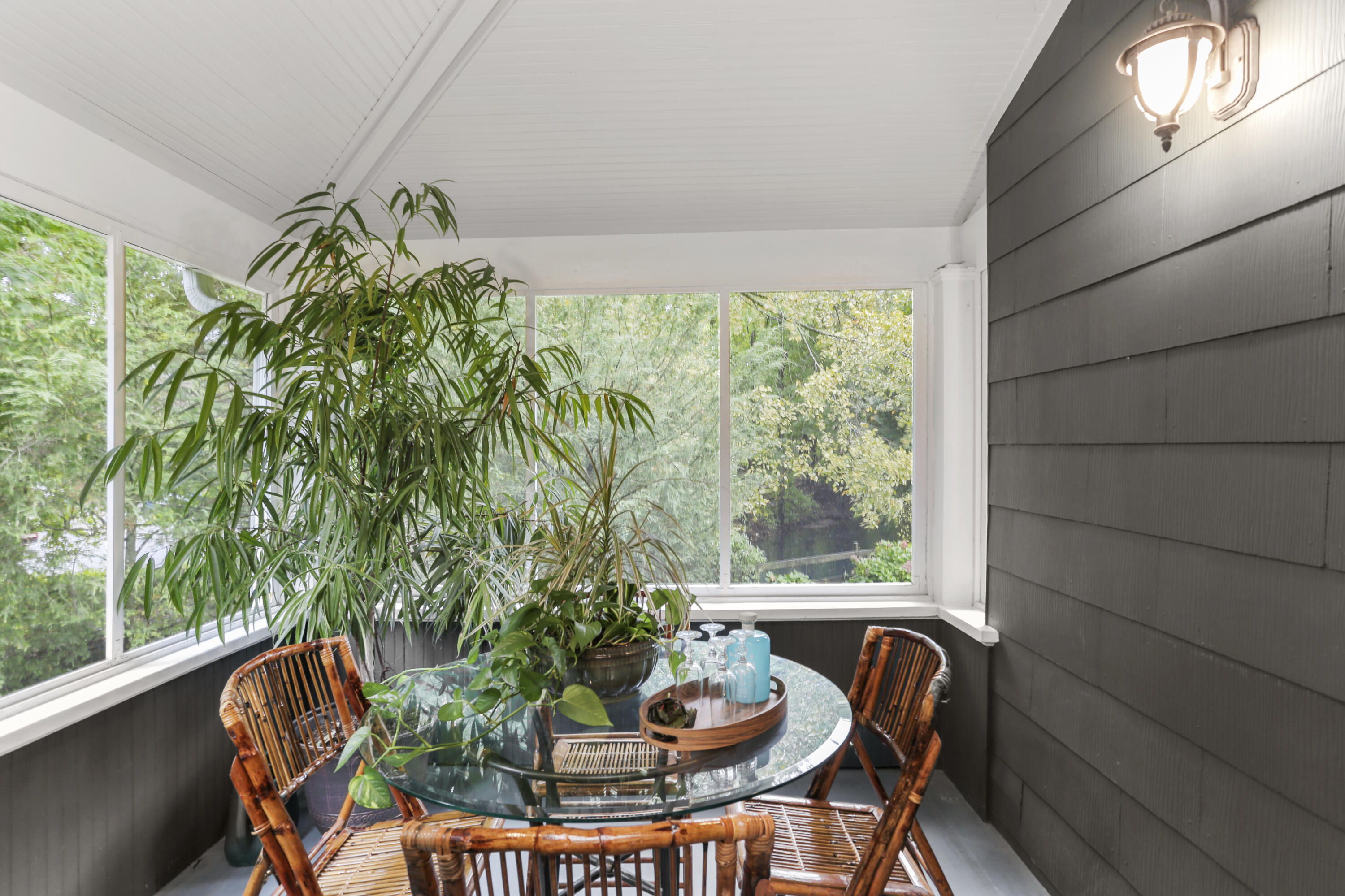 6 Park Lane Darien, CT 06820 - Photo 9 of 34 a view of a porch with furniture and a yard