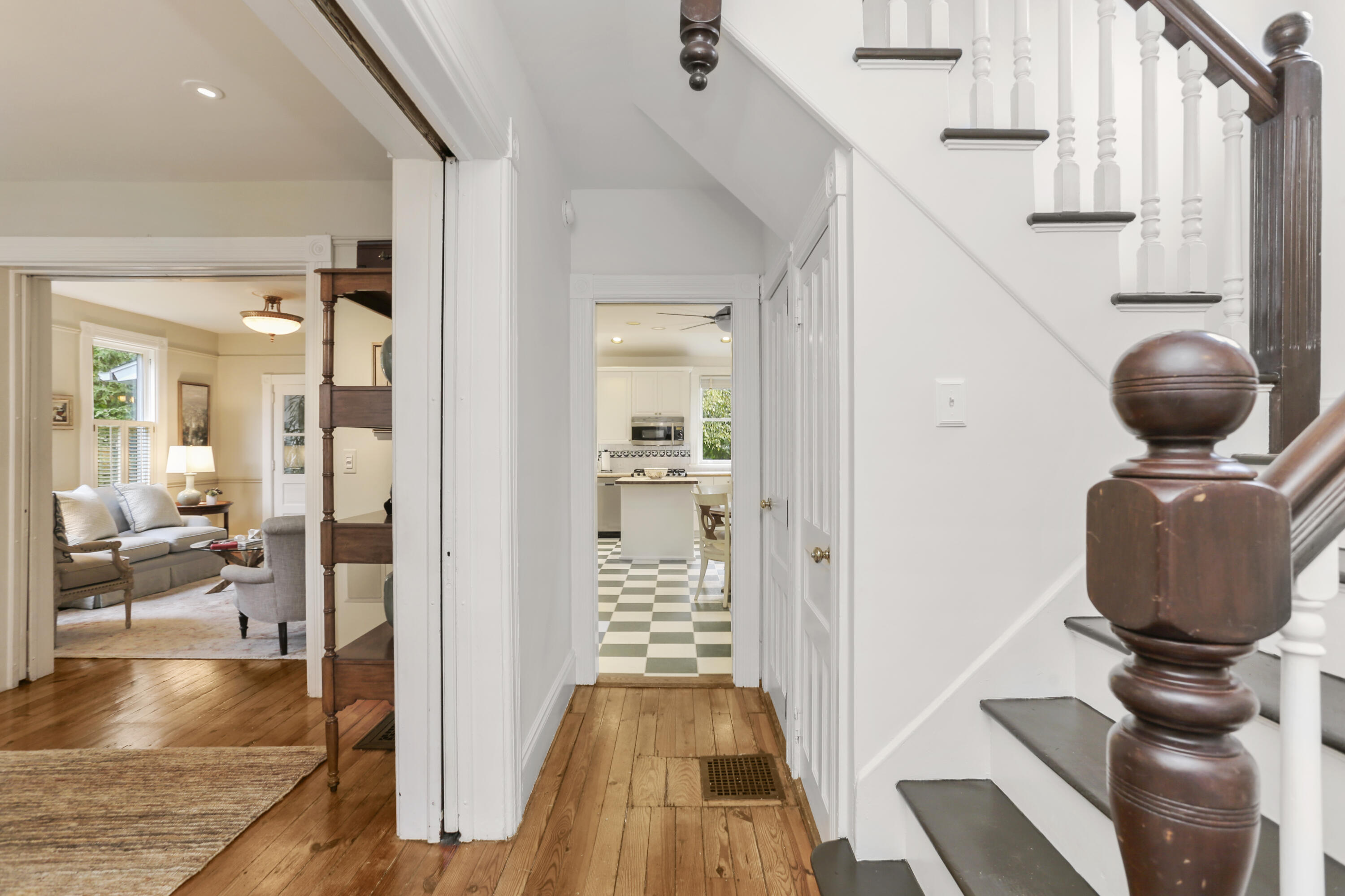 6 Park Lane Darien, CT 06820 - Photo 10 of 34 a view of a hallway with living room and wooden floor
