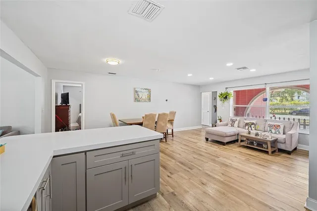 a room with furniture and wooden floor