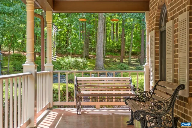 a view of balcony with couch and outdoor seating