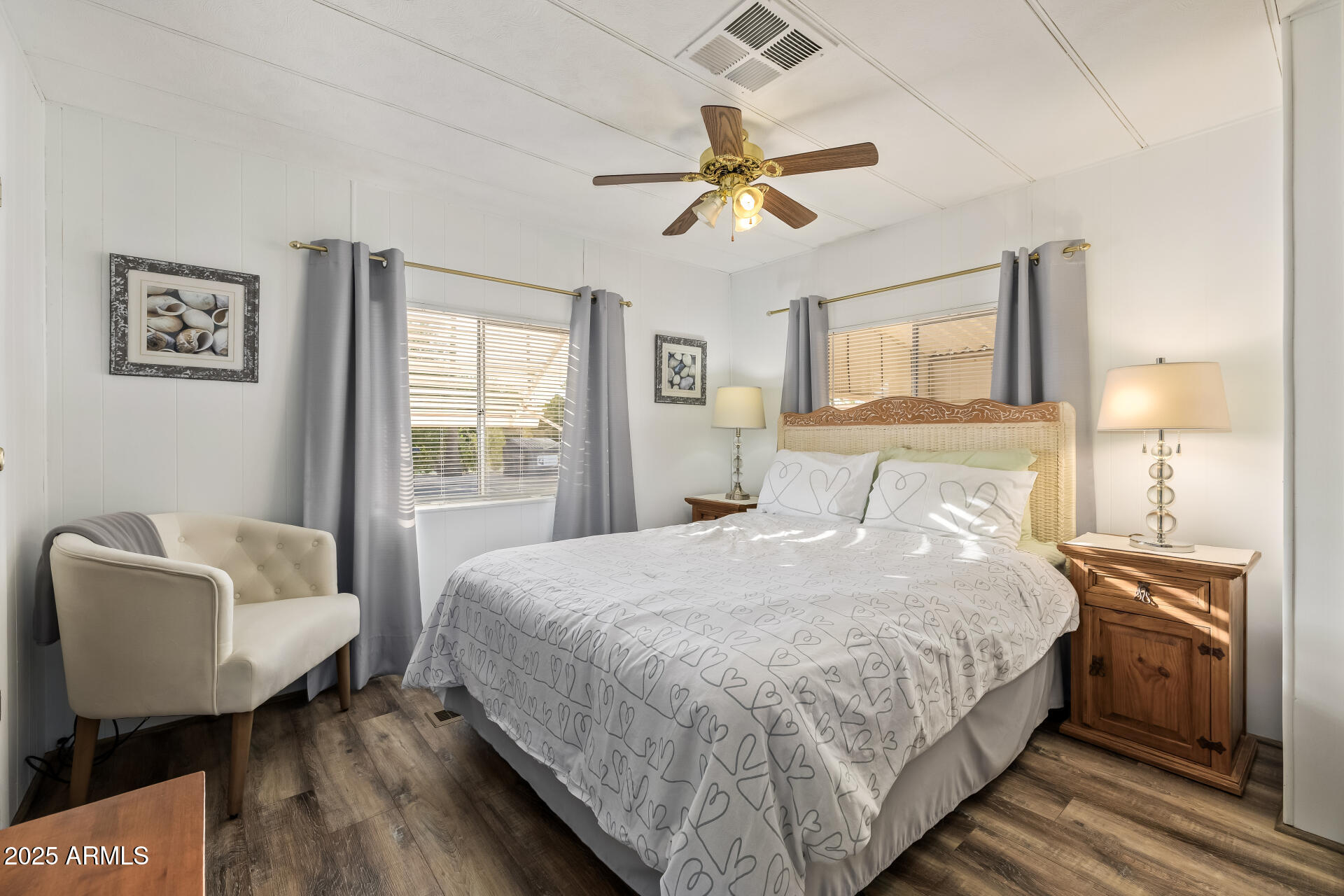 11425 East University Drive, Unit 120 Apache Junction, AZ 85120 - Photo 16 of 43 a bedroom with a bed and a window