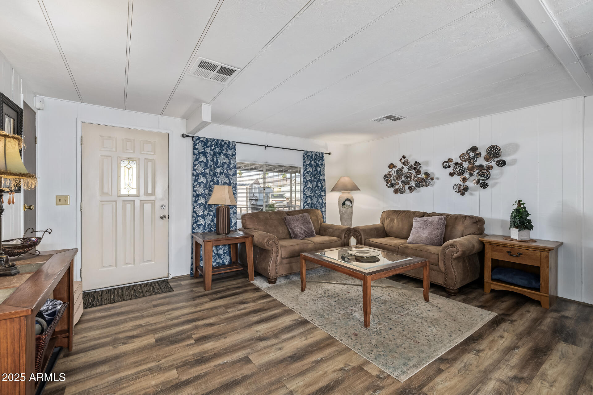 11425 East University Drive, Unit 120 Apache Junction, AZ 85120 - Photo 3 of 43 a living room with furniture and wooden floor