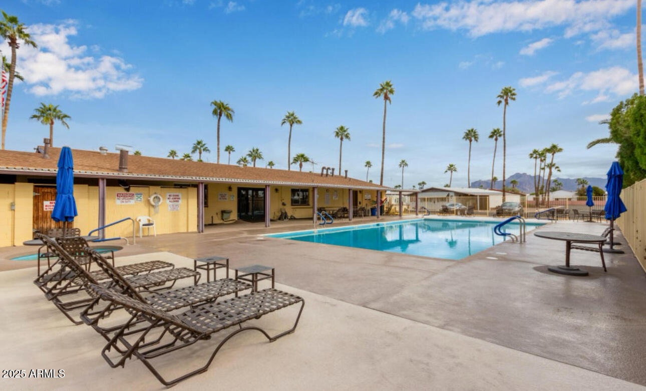 11425 East University Drive, Unit 120 Apache Junction, AZ 85120 - Photo 35 of 43 a front view of a house with sitting area
