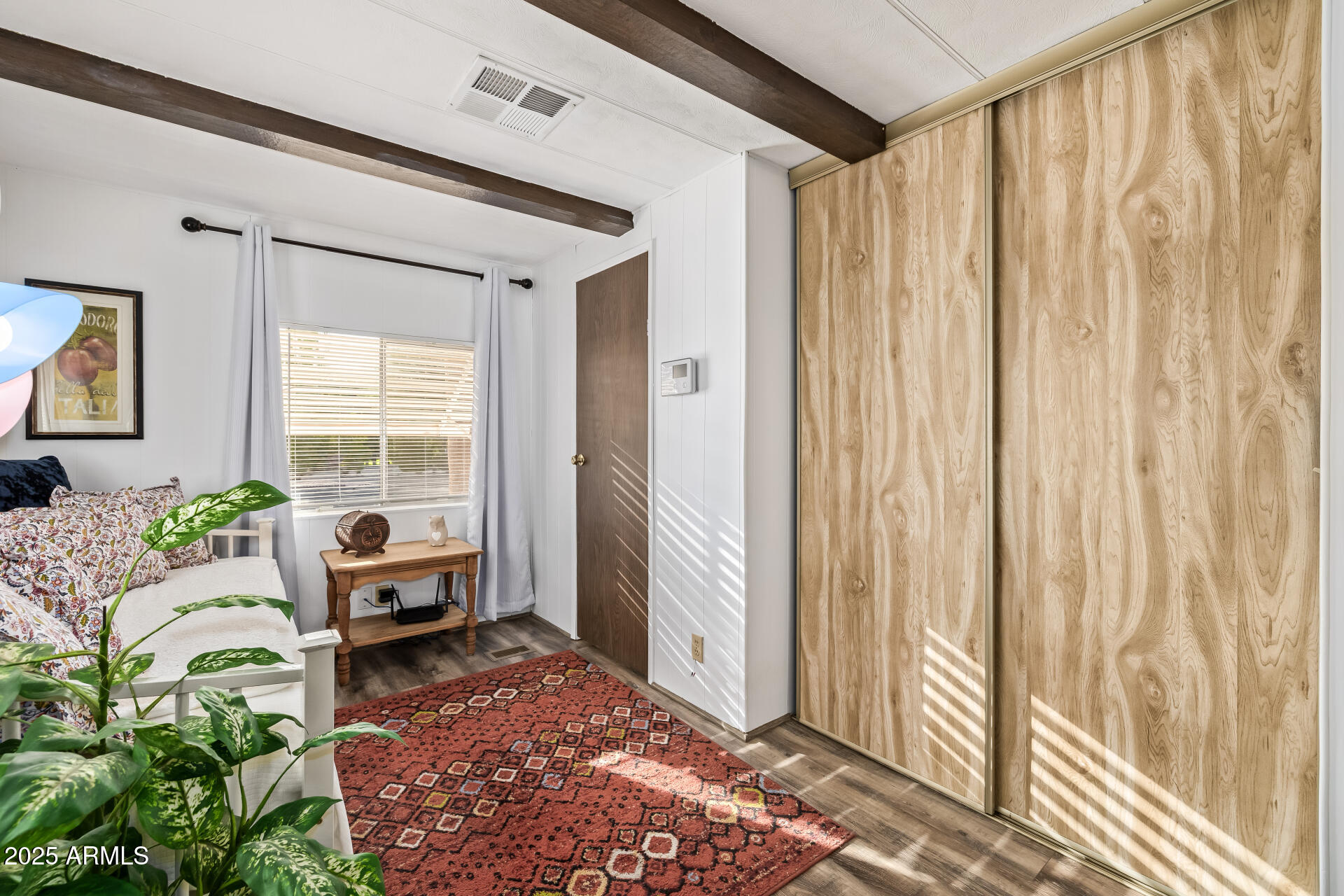 11425 East University Drive, Unit 120 Apache Junction, AZ 85120 - Photo 7 of 43 a living room with furniture and a window