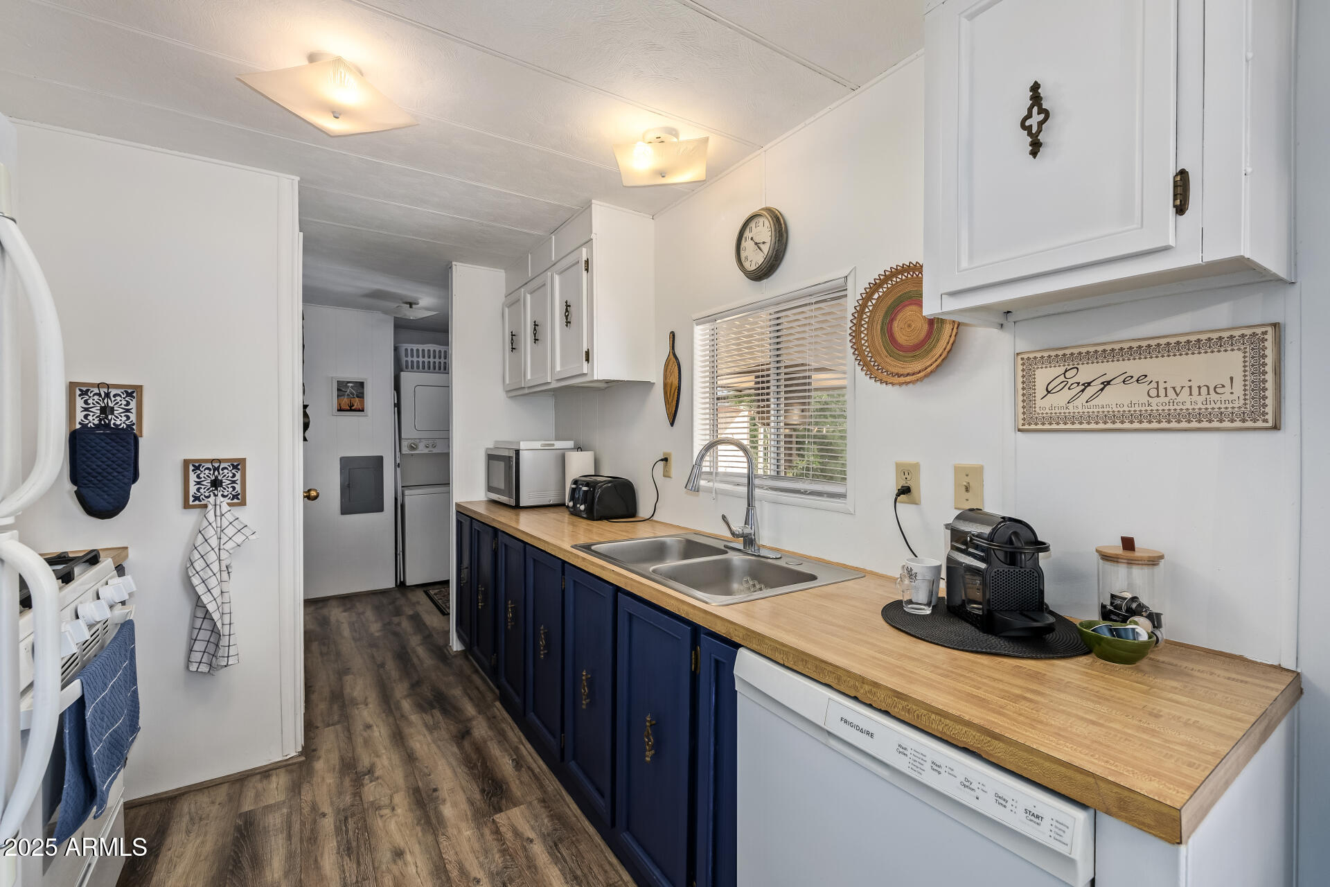 11425 East University Drive, Unit 120 Apache Junction, AZ 85120 - Photo 9 of 43 a kitchen with a sink and cabinets