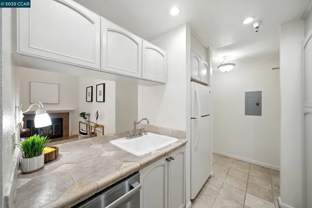 a bathroom with a sink a vanity and a mirror