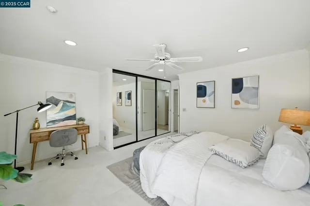 a bedroom with a bed and furniture