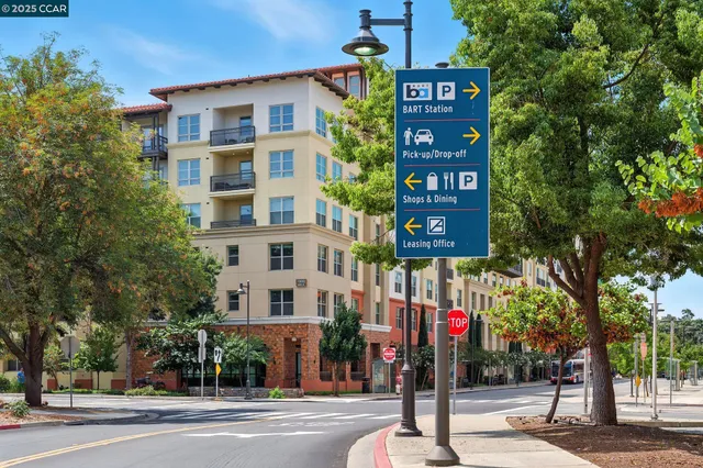 a sign on a pole on a street