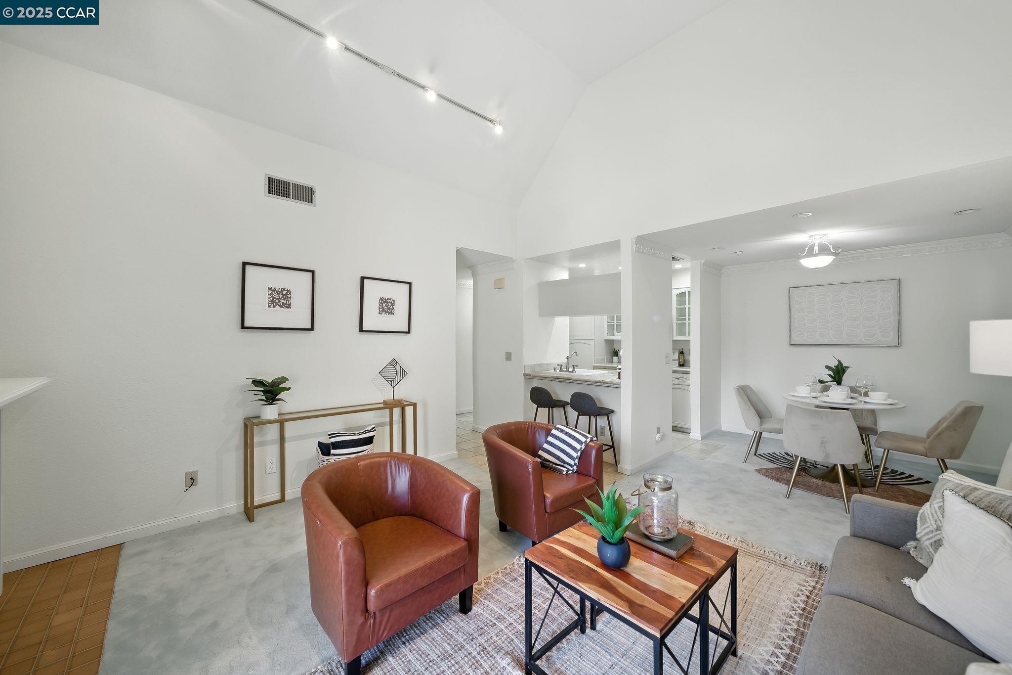 3183 Wayside Plaza, Unit 320 Walnut Creek, CA 94597 - Photo 4 of 34 a living room with furniture