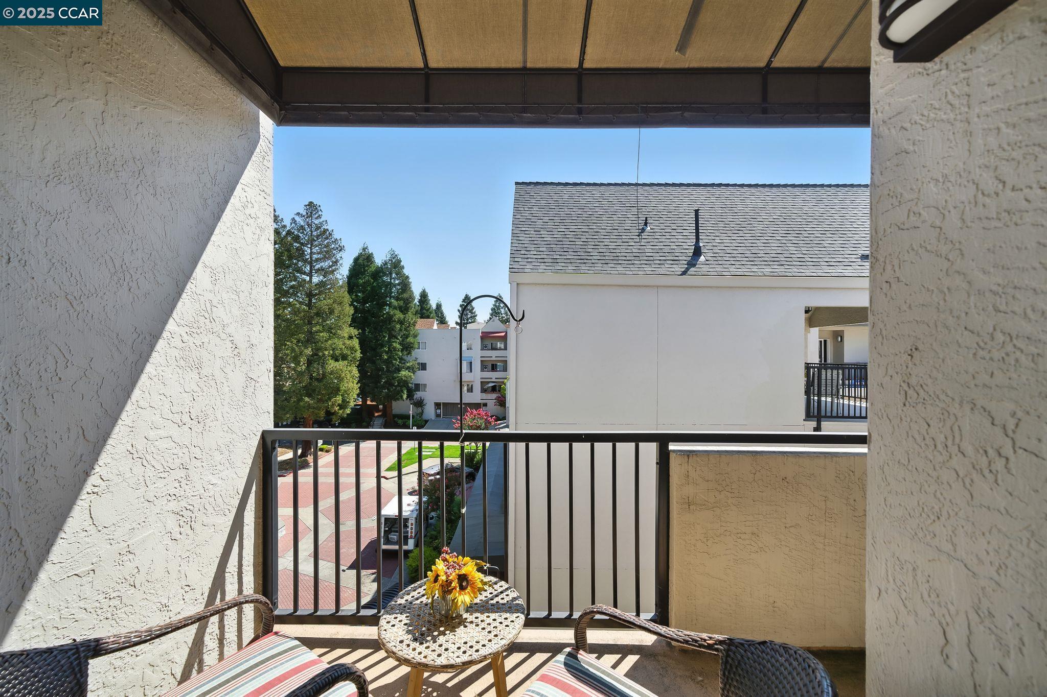 3183 Wayside Plaza, Unit 320 Walnut Creek, CA 94597 - Photo 6 of 34 a view of balcony and wooden floor