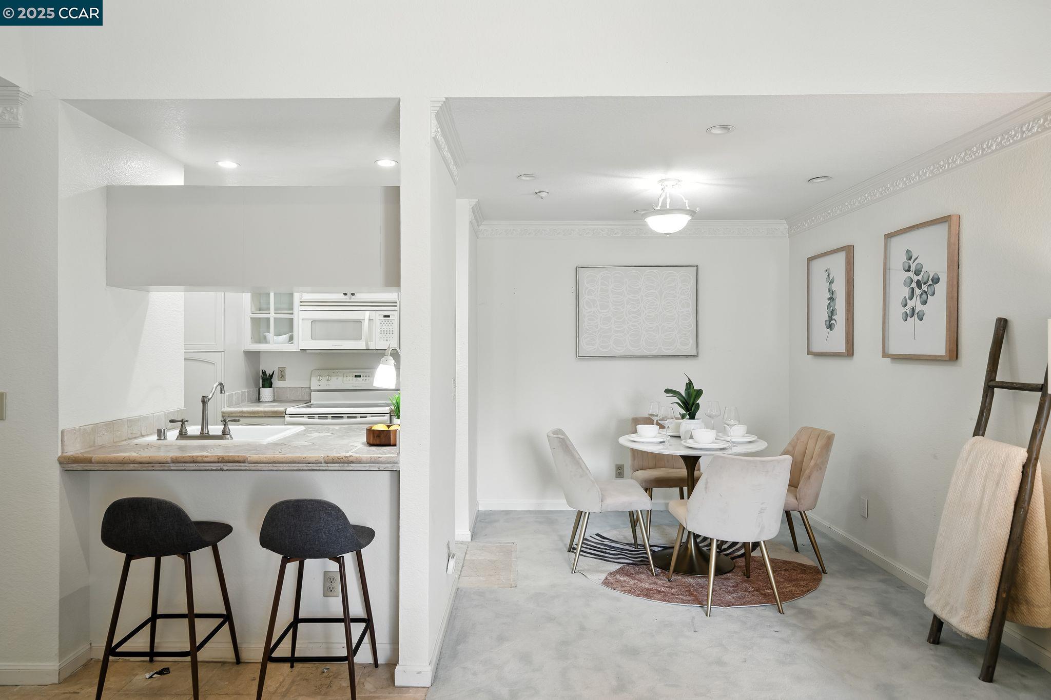 3183 Wayside Plaza, Unit 320 Walnut Creek, CA 94597 - Photo 9 of 34 a view of a dining room with furniture