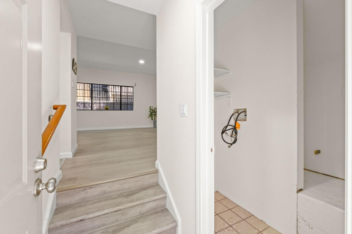 415 C Street Colma, CA 94014 - Photo 37 of 57 a view of a hallway with wooden floor and entryway