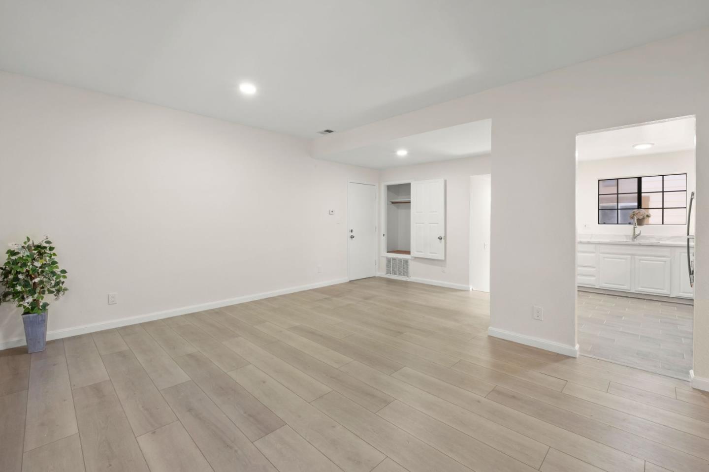 415 C Street Colma, CA 94014 - Photo 40 of 57 wooden floor in an empty room with a window
