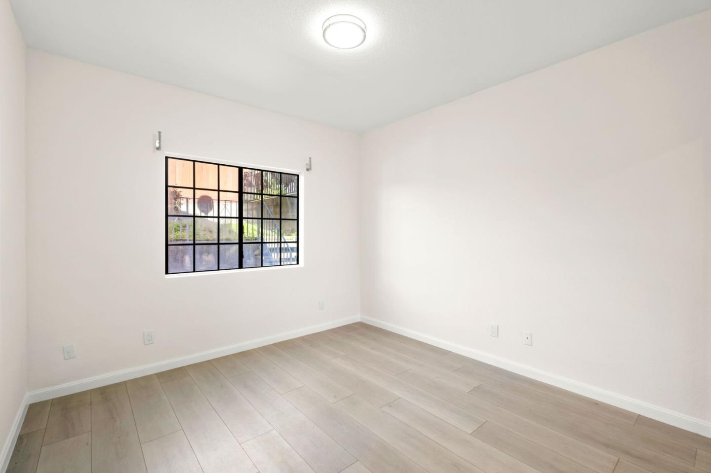 415 C Street Colma, CA 94014 - Photo 45 of 57 an empty room with a window