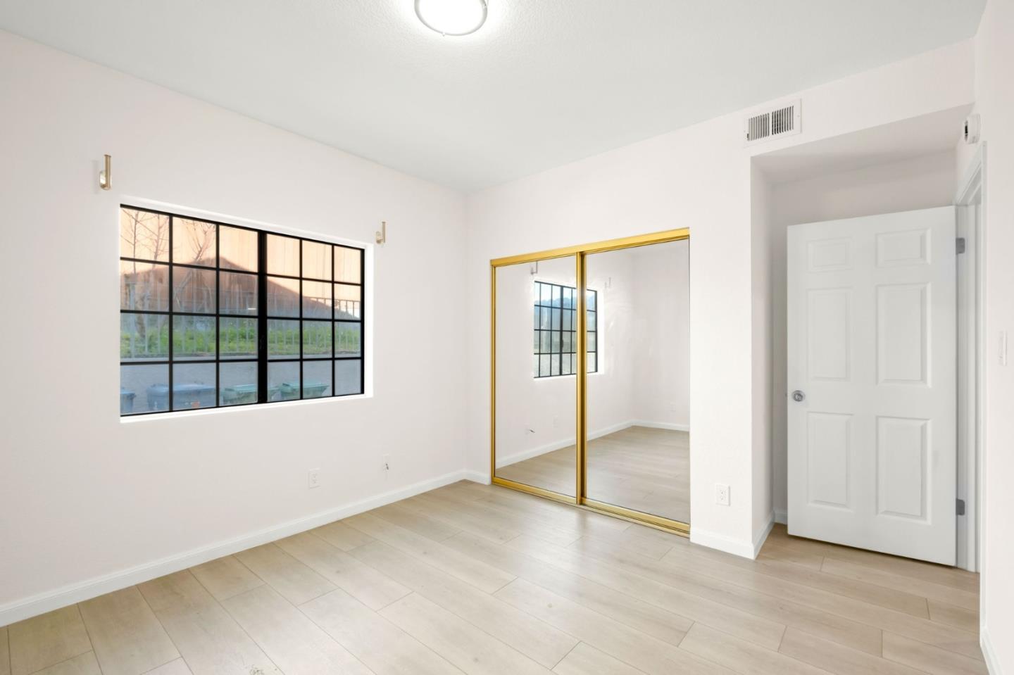 415 C Street Colma, CA 94014 - Photo 47 of 57 an empty room with windows