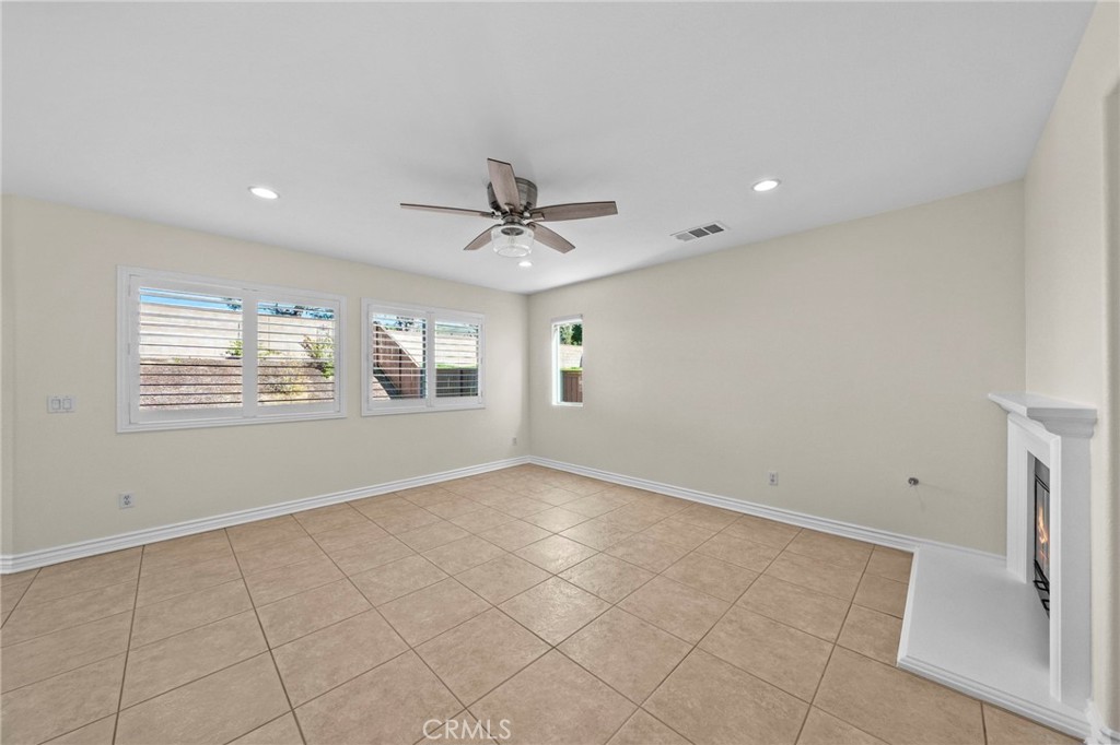 11344 Magnolia Street Corona, CA 92883 - Photo 13 of 75 a view of an empty room with a window