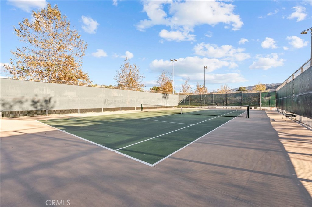 11344 Magnolia Street Corona, CA 92883 - Photo 69 of 75 a view of a tennis court