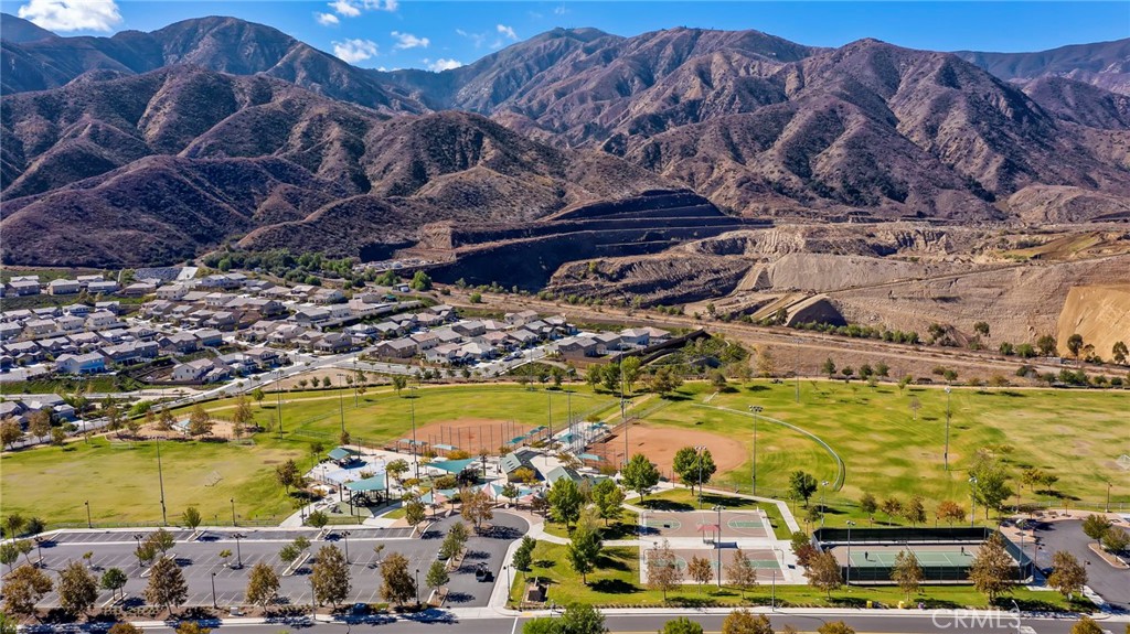 11344 Magnolia Street Corona, CA 92883 - Photo 75 of 75 a view of a swimming pool with an ocean view