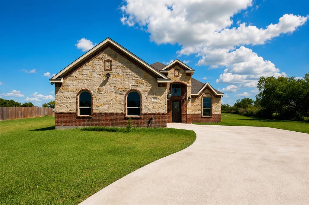 Stone and brick exterior with arched windows
