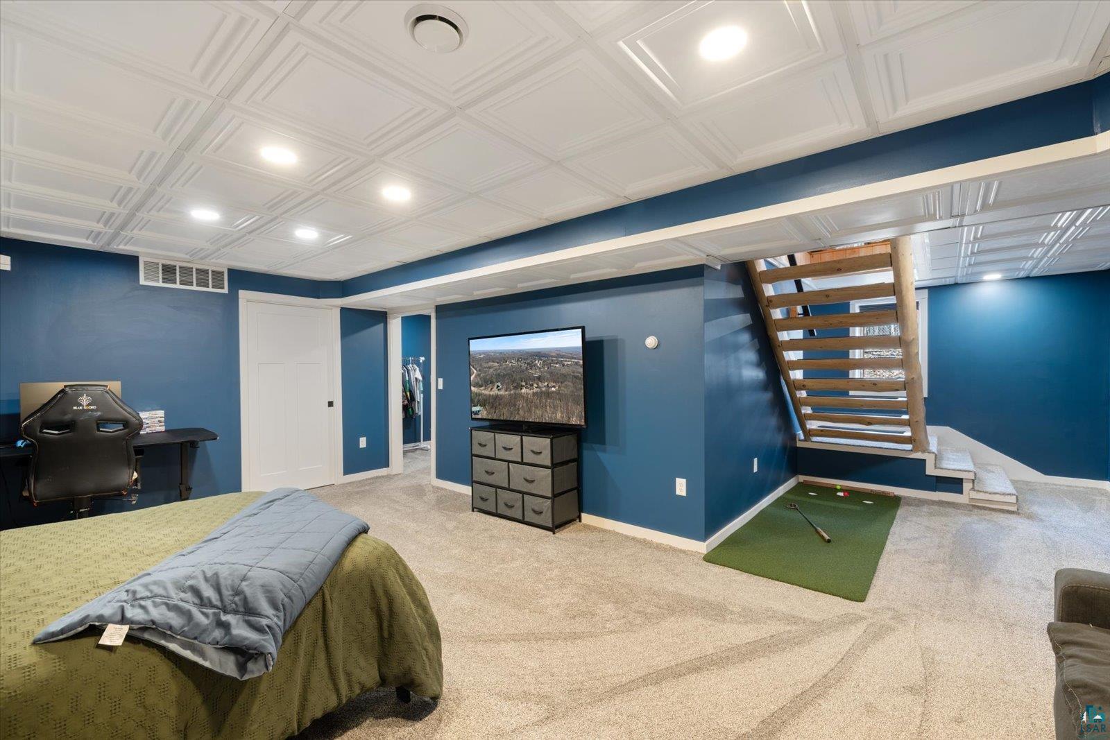 717 Bourgin Road Virginia, MN 55792 - Photo 34 of 47 Carpeted bedroom featuring recessed lighting, baseboards, and an ornate ceiling