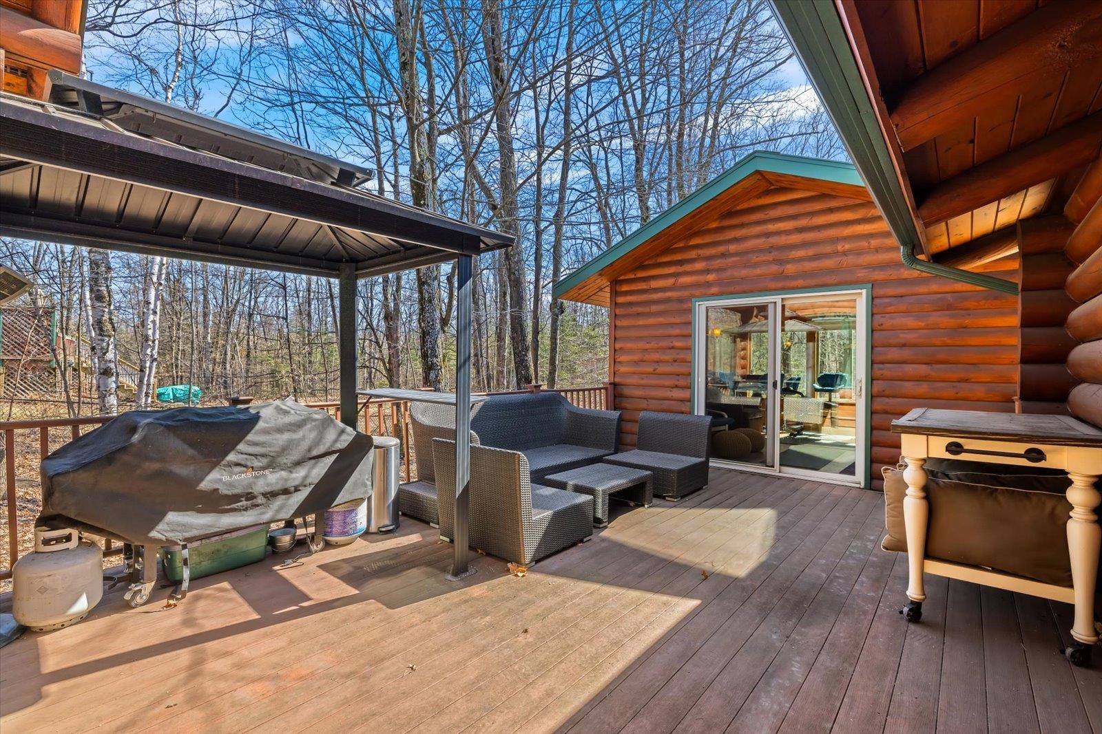 717 Bourgin Road Virginia, MN 55792 - Photo 44 of 47 Wooden terrace with a grill